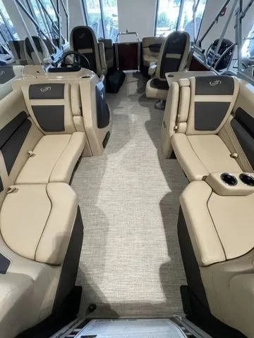 Slide: The Image of 2023 Barletta Boats C20QC interior with beige seating and modern design. - 5