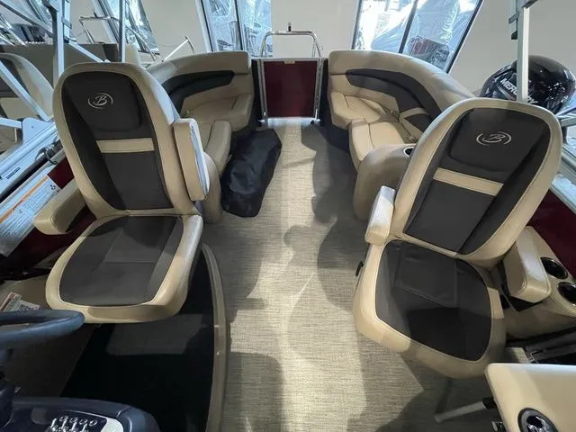 Slide: The Image of 2023 Barletta Boats C20QC interior with luxurious seating and modern design. - 7