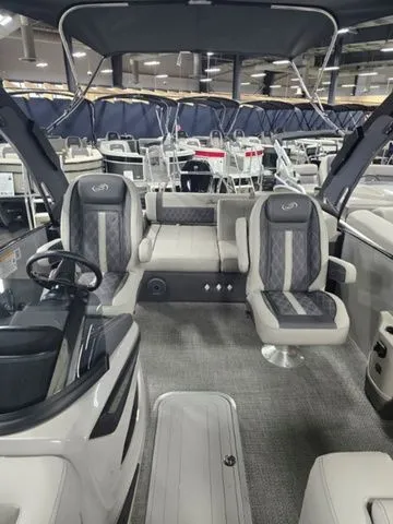 Slide: The Image of Luxurious 2025 Barletta Boats R23UCA interior with plush seating and modern design. - 4