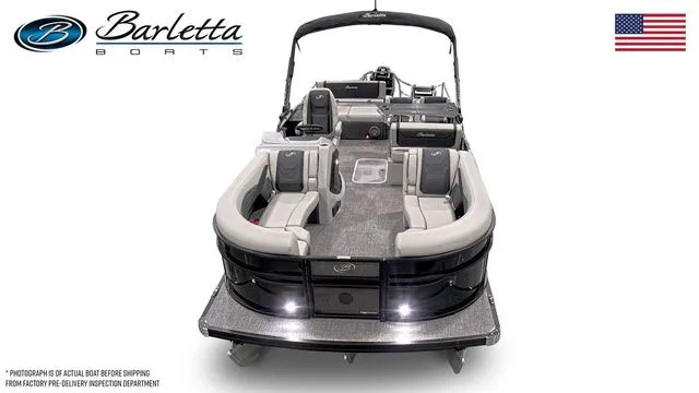 Slide: The Image of 2026 Barletta Boats C24UE pontoon with luxurious seating and sleek design, featuring American flag. - 5