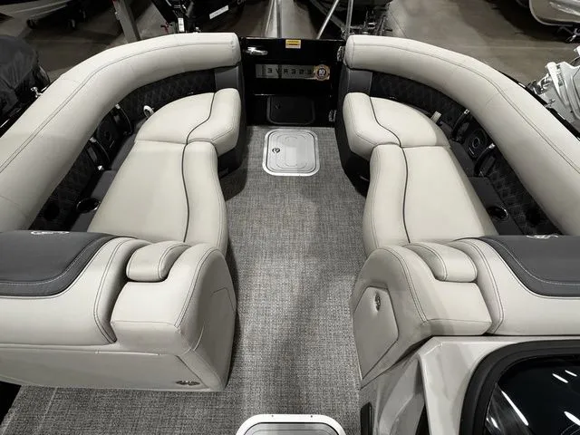 Slide: The Image of Luxurious 2025 Barletta Boats R23UCA interior with plush seating and modern design. - 14