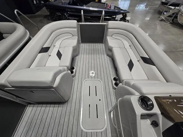 Slide: The Image of 2024 SunCatcher Select 322RC pontoon boat interior with spacious seating and modern design. - 5