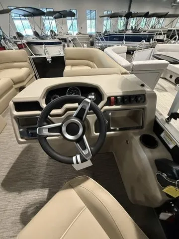 Slide: The Image of 2026 Godfrey Pontoons Xperience 2286 SBX Sport Tube interior with steering wheel and dashboard. - 11