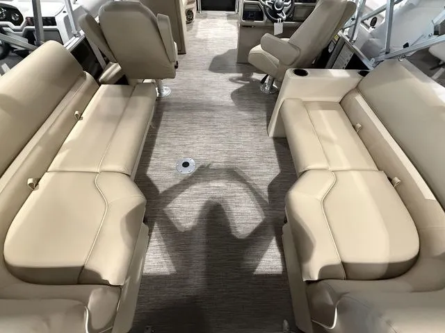 Slide: The Image of Interior of 2026 Godfrey Pontoons Xperience 2286 SBX with beige seating and carpeted floor. - 9