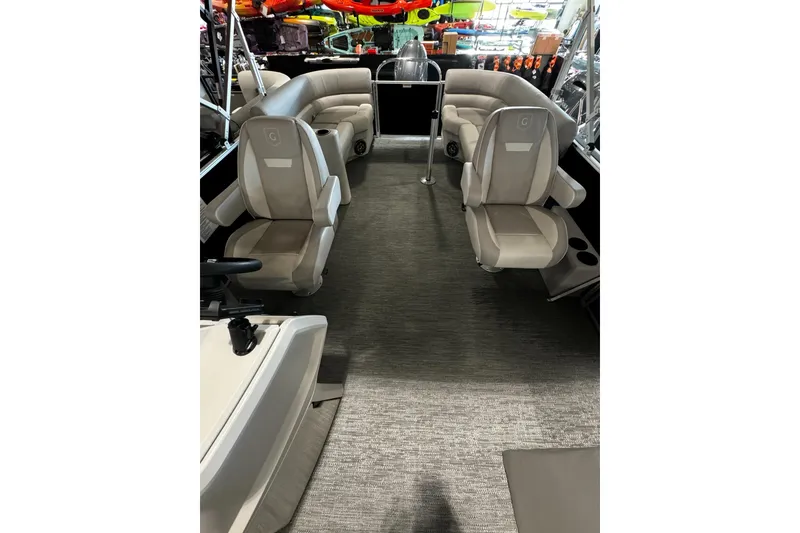 Slide: The Image of 2026 Godfrey Xperience 2286 SBX Sport Tube interior with plush seating and modern design. - 4