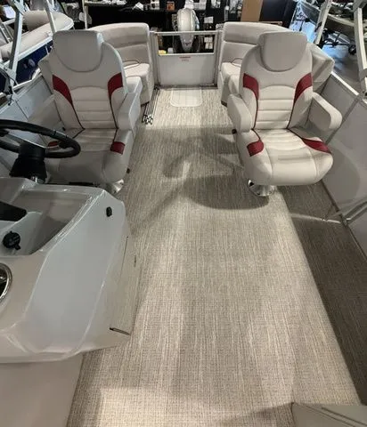 Slide: The Image of 2023 SunCatcher Select 20RC boat interior with plush seating and modern design. - 4