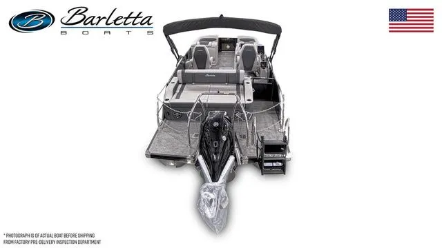Slide: The Image of 2025 Barletta Corsa 23UC boat, sleek design, luxury seating, American flag, top view. - 6