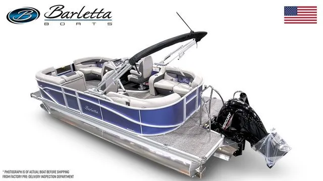 Slide: The Image of 2025 Barletta Boats C20QC pontoon with sleek design and powerful outboard motor. - 3