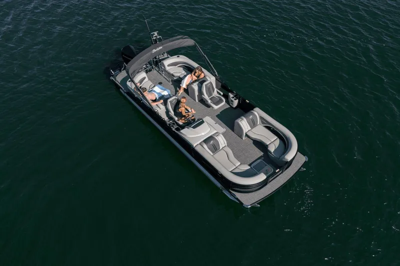 Slide: The Image of 2025 Barletta CORSA 23QCSS pontoon boat on water, featuring spacious seating and modern design. - 8