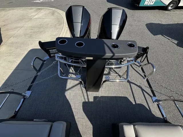 Slide: The Image of 2025 Barletta Lusso L25MAT boat with dual engines and sleek design. - 11