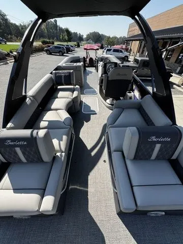 Slide: The Image of 2025 Barletta Lusso L25MAT boat interior with luxurious seating and modern design. - 12