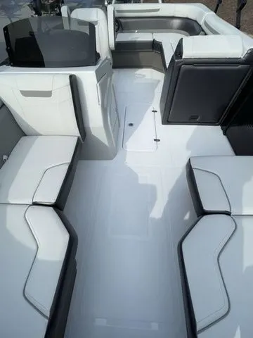 Slide: The Image of 2024 Hurricane FunDeck 1960 RE OB interior with spacious seating and modern design. - 8