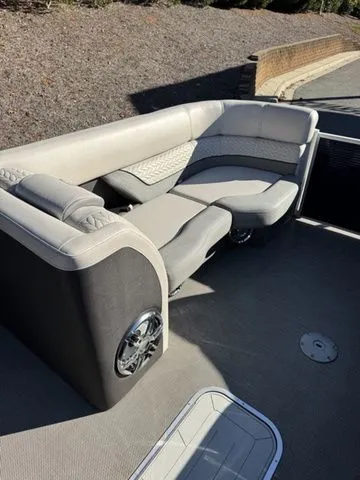 Slide: The Image of 2022 Godfrey Pontoons Monaco 235 interior with plush seating and modern design. - 3