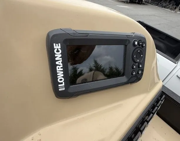 Slide: The Image of Lowrance fish finder on 2020 Barletta Boats C20Q dashboard. - 10