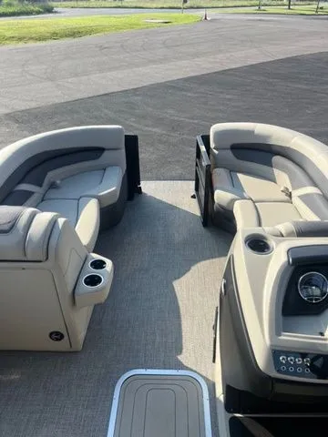 Slide: The Image of 2023 Barletta Boats C20Q interior with plush seating and modern design. - 5