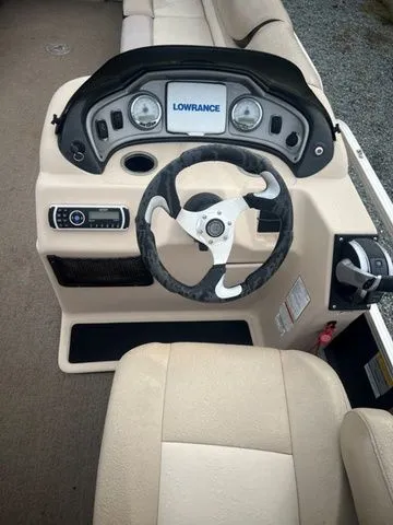 Slide: The Image of 2015 Sun Tracker PARTY BARGE® 24 XP3 helm with Lowrance system and steering wheel. - 5