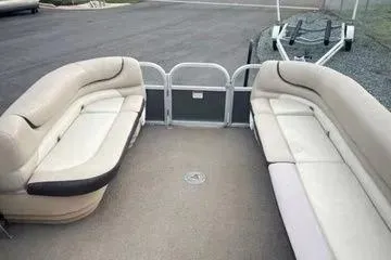 Slide: The Image of 2015 Sun Tracker PARTY BARGE® 24 XP3 pontoon boat interior with beige seating. - 8