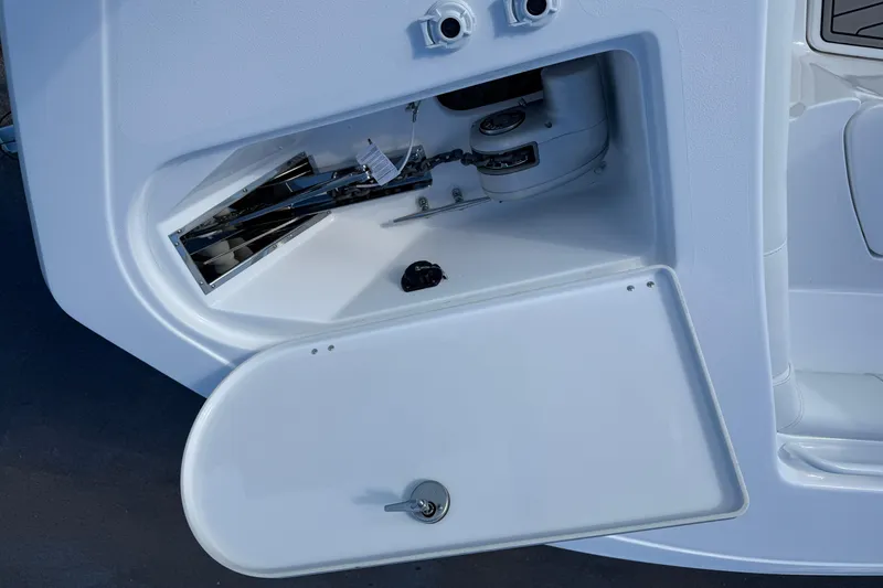 Slide: The Image of 2026 Tidewater 272 CC Adventure boat anchor compartment detail. - 11