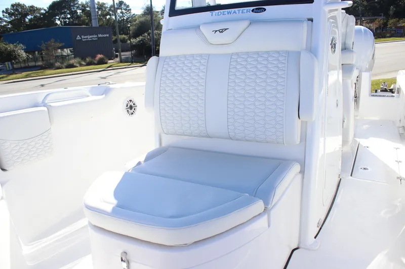 Slide: The Image of 2026 Tidewater 272 CC Adventure boat with luxurious white seating and modern design. - 14