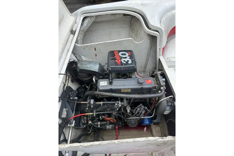 Slide: The Image of 1991 Chris-Craft 167 Concept boat engine compartment with visible components and wiring. - 3