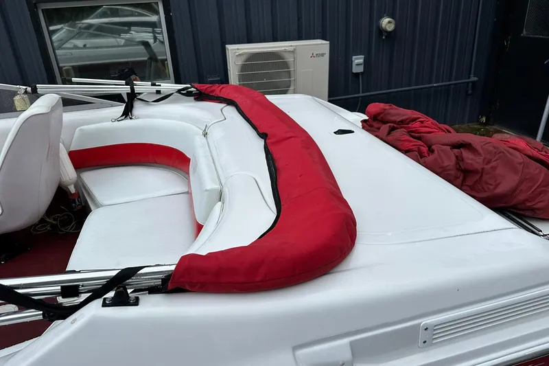 Slide: The Image of 1991 Chris-Craft 167 Concept boat interior with red and white seating. - 5