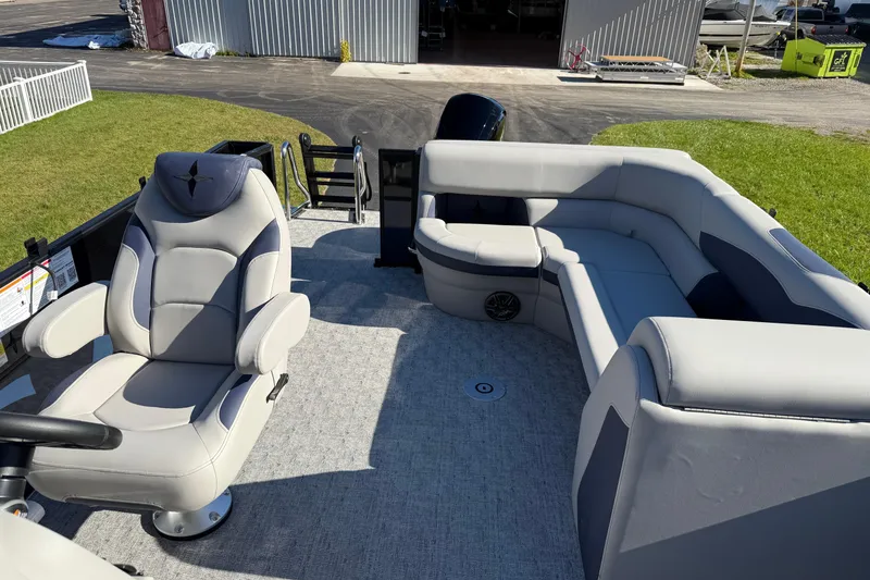Slide: The Image of 2026 Berkshire 22 CL2 LE pontoon boat interior with plush seating and modern design. - 5