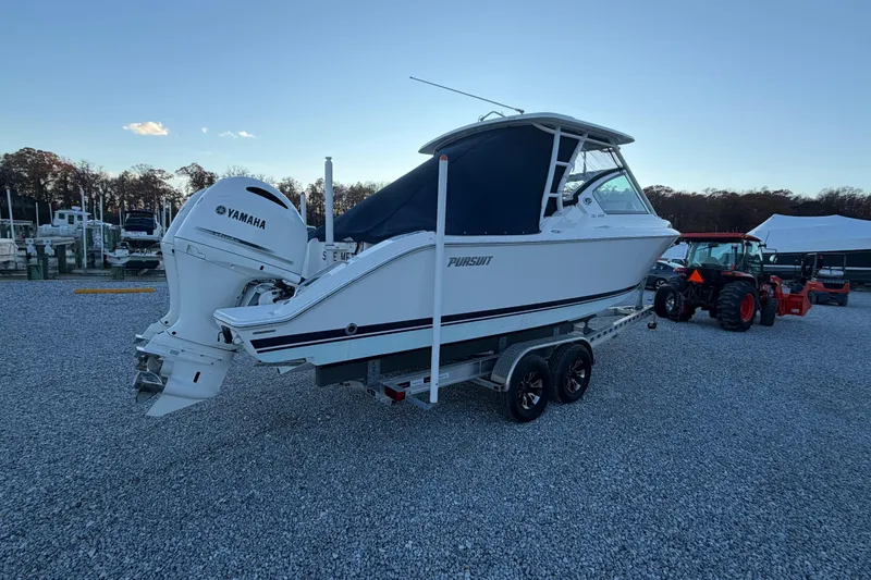 Slide: The Image of 2022 Pursuit DC 266 Dual Console boat with Yamaha engine on trailer. - 27