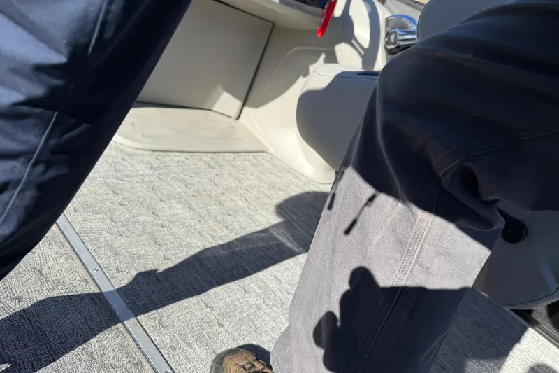 Slide: The Image of Interior view of 2026 Berkshire 22 RFX LE boat with carpeted flooring. - 12