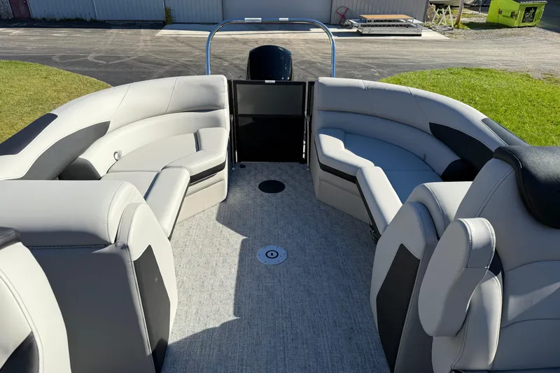 Slide: The Image of 2026 Berkshire 22 RFX LE pontoon boat interior with plush seating and modern design. - 8