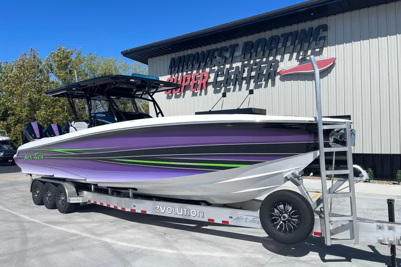 The Image of 2026 Nor-Tech 340 Sport Center Console boat on trailer at Midwest Boating Super Center. - 1