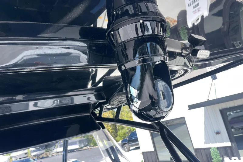 Slide: The Image of Close-up of 2026 Nor-Tech 340 Sport Center Console's sleek black camera system. - 16