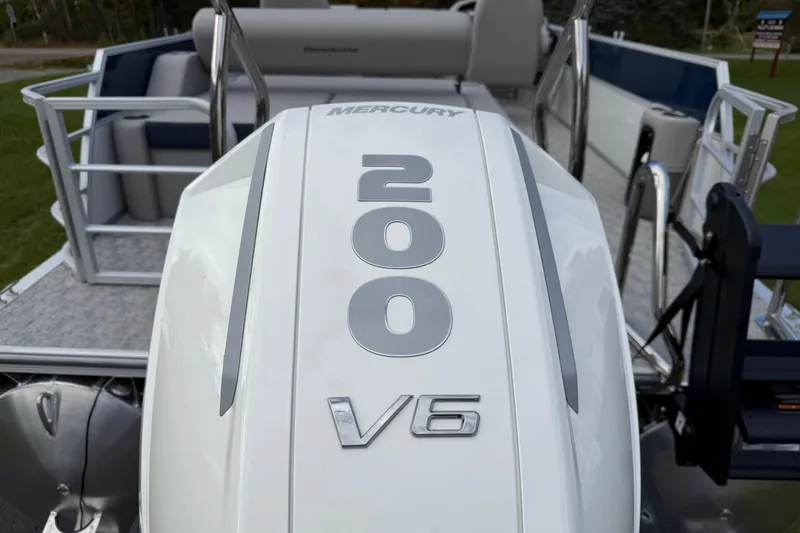 Slide: The Image of 2026 Berkshire 24 UL LE boat with Mercury 200 V6 engine, rear view. - 12