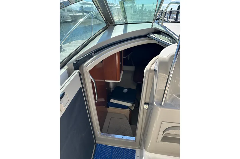 Slide: The Image of 2008 Sea Ray 290 Sundancer cabin entrance with interior view. - 12