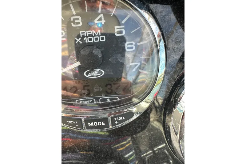 Slide: The Image of Close-up of 2008 Sea Ray 290 Sundancer RPM gauge, showing 3.2 hours. - 21