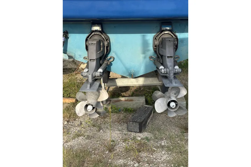 Slide: The Image of 2008 Sea Ray 290 Sundancer boat propellers on dry land. - 5