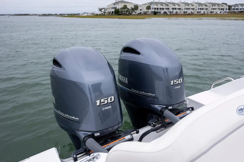 Slide: The Image of Twin Yamaha 150 outboard engines on 2023 Sea Hunt Ultra 265 SE boat. - 8