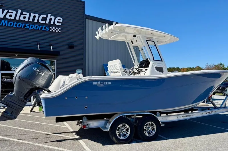 The Image of 2026 Sea Fox 268 Commander boat on trailer outside Avalanche Motorsports. - 0