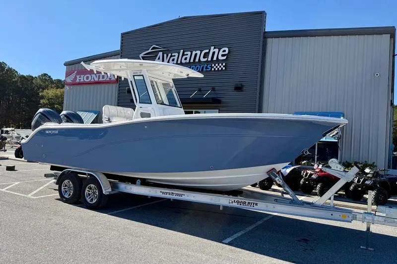 Slide: The Image of 2026 Sea Fox 268 Commander boat on trailer at dealership. - 1