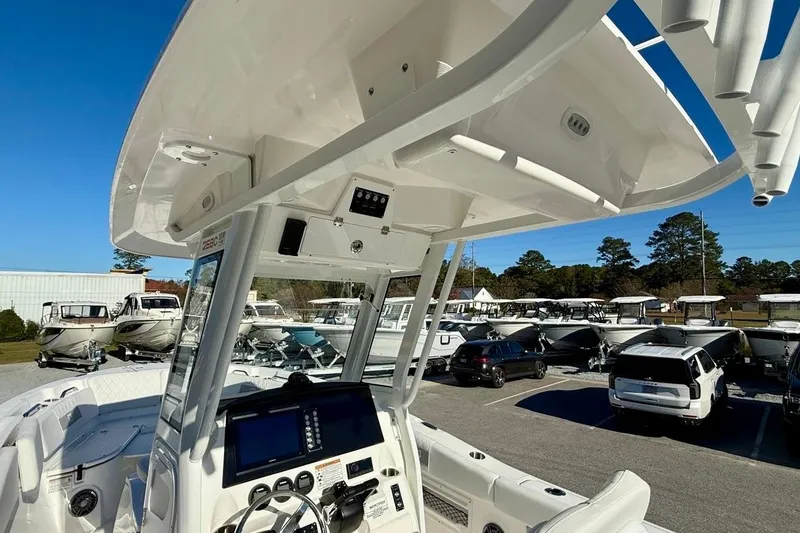 Slide: The Image of 2026 Sea Fox 268 Commander boat interior with control panel and overhead view. - 13