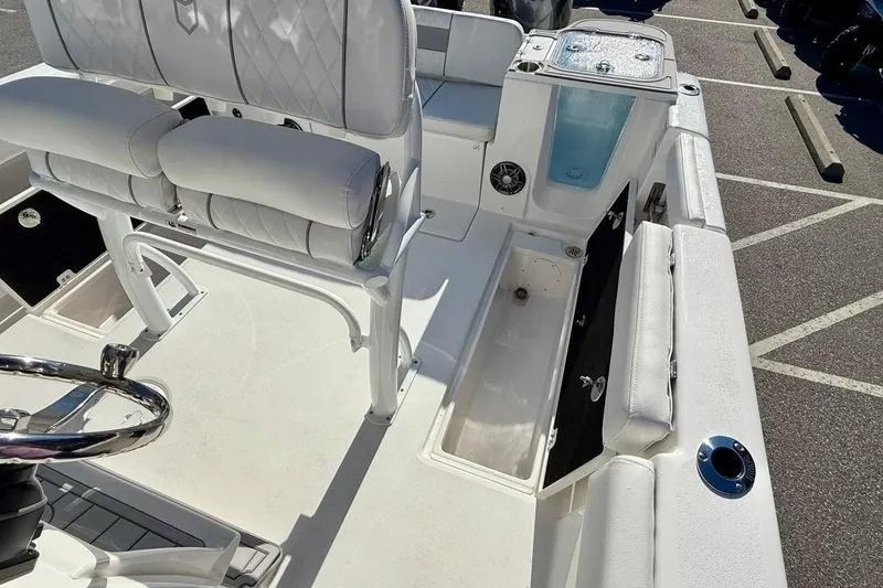 Slide: The Image of 2026 Sea Fox 268 Commander boat interior with seating and storage compartments. - 19