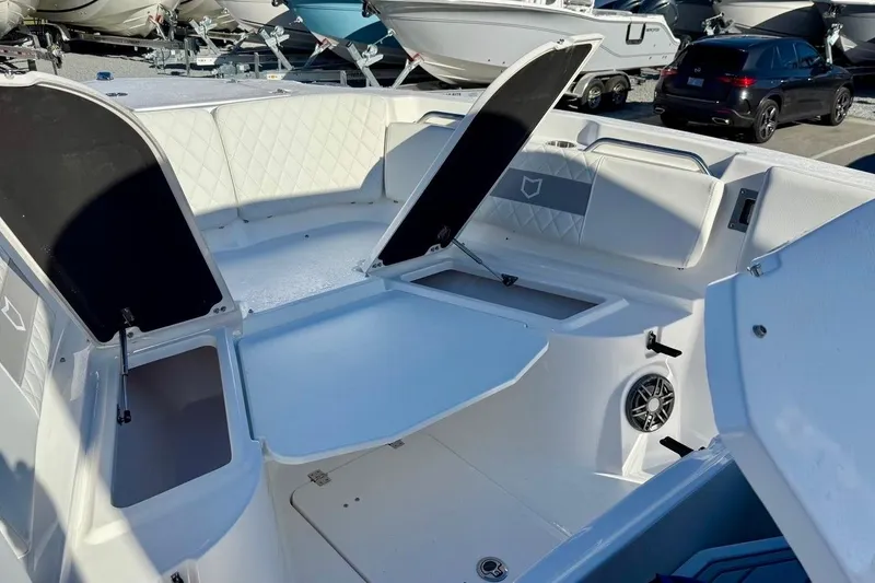 Slide: The Image of 2026 Sea Fox 268 Commander boat interior with open storage compartments. - 6