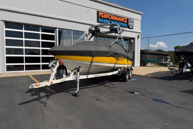 Slide: The Image of 2002 MasterCraft X30 boat on trailer at Performance Marine Watersports dealership. - 24