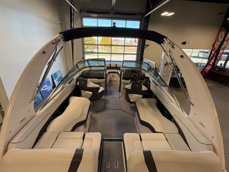 Slide: The Image of 2016 Regal 2300 Bowrider interior with spacious seating and modern design in showroom. - 7
