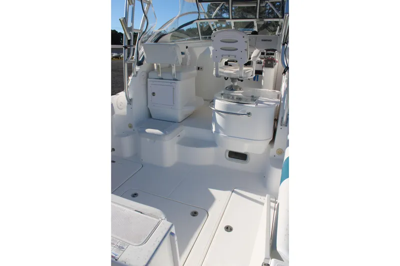Slide: The Image of 2008 Pro-Line 29 Express O/B boat interior with seating and control panel. - 13