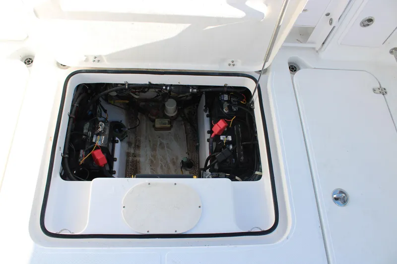 Slide: The Image of Engine compartment of 2008 Pro-Line 29 Express O/B boat, showcasing internal components. - 21