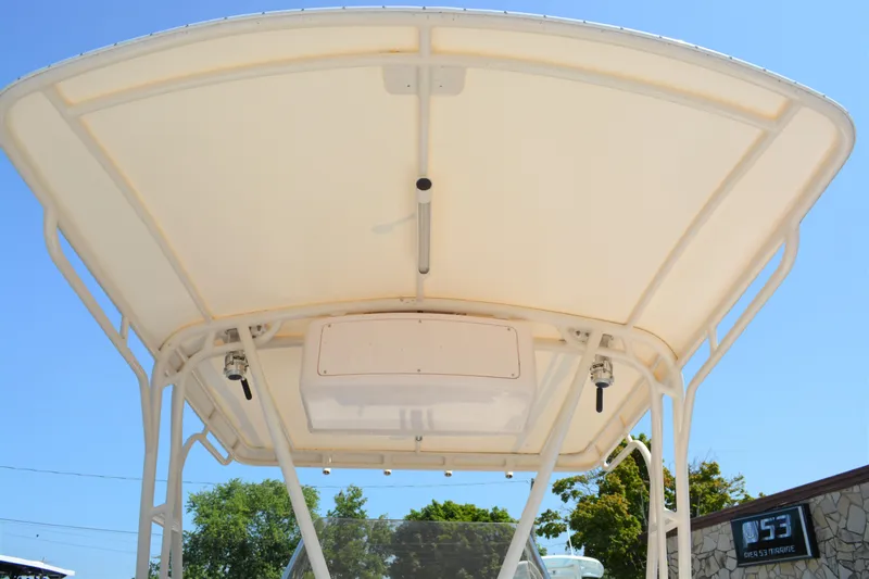 Slide: The Image of 2001 Intrepid 322 Cuddy boat canopy, viewed from below, against a clear blue sky. - 22