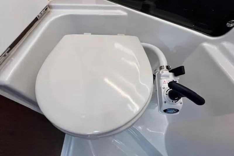 Slide: The Image of 2023 Beneteau Antares 9 marine toilet with manual flush system. - 28