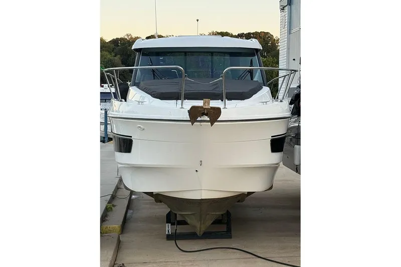 Slide: The Image of 2023 Beneteau Antares 9 boat on dry dock, front view. - 6