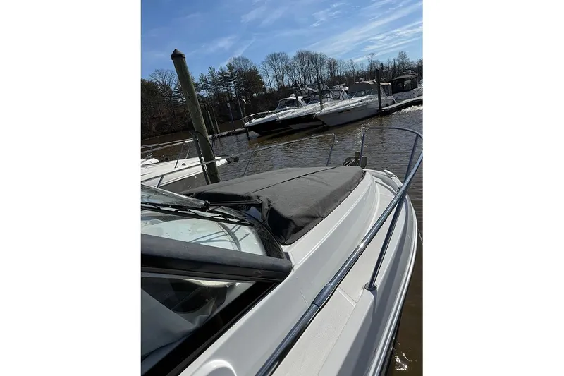 Slide: The Image of 2023 Beneteau Antares 9 docked, showcasing sleek design and modern features. - 9