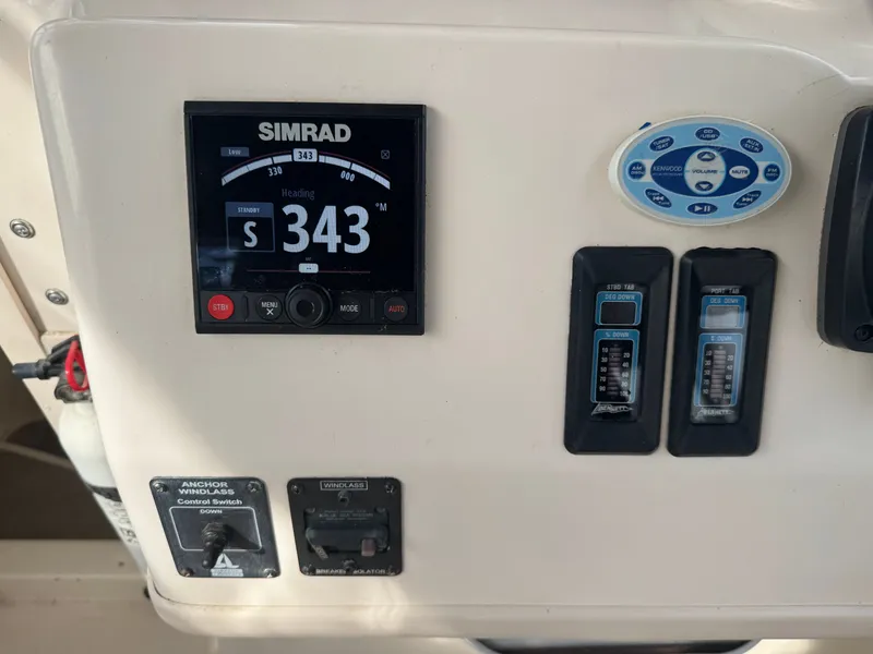 Slide: The Image of Control panel of a 2004 Grady-White Marlin 300 boat with Simrad display. - 15